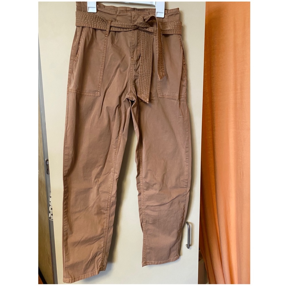 High waisted, dark khaki/brown pants with a string belt